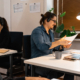 Two phone proposals reviewed against the same business requirements checklist.